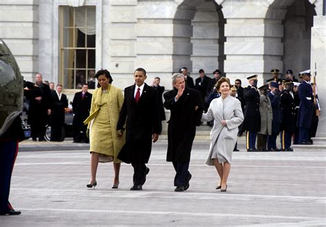 First Lady Michelle Obama And President Barack Obama Escort Former President George W Bush And