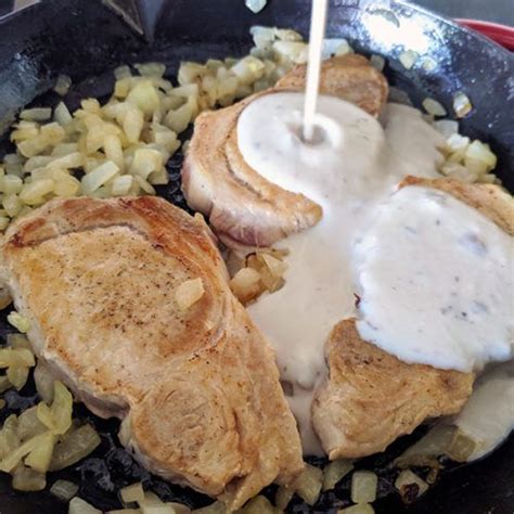 I never thought of adding potatoes to the pork chops. Baked Pork Chops With Cream of Mushroom Soup - The Kitchen Magpie in 2020 | Baked pork chops ...