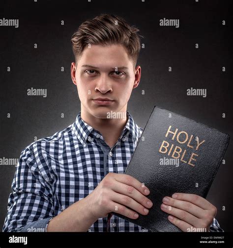 Hand Holding Holy Bible Hi Res Stock Photography And Images Alamy