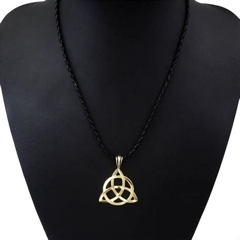 Not originally a celtic symbol. Celtic Knot Triquetra Gold Pewter Pendant with 24" Necklace - Mystical Breath