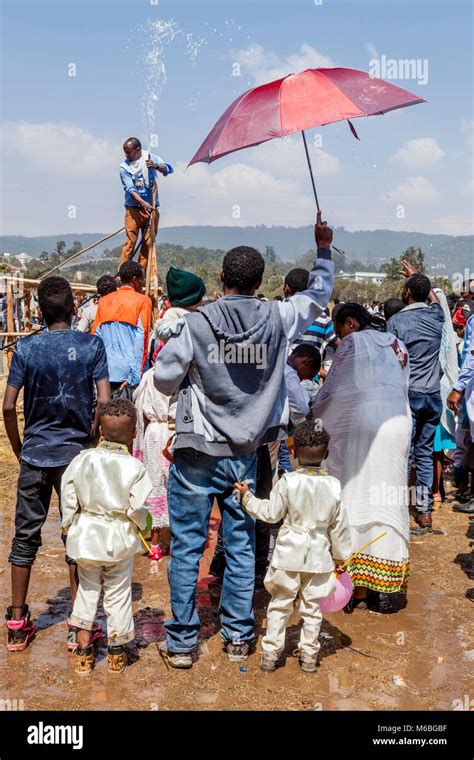 Ethiopian Christians Are Sprinkled With Blessed Water To Celebrate The