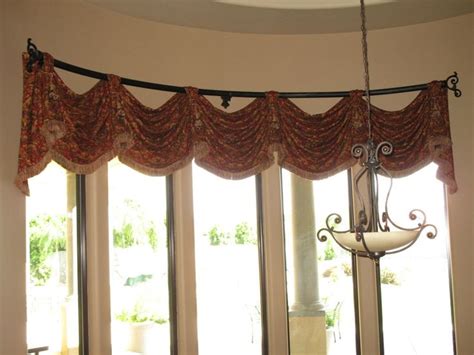 How to hang curtains and window coverings, according to pros. curved valance - Google Search | curtains | Pinterest ...