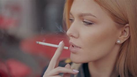 Beautiful Blonde Girl Woman Smoking Stock Footage Video