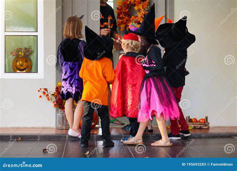 Kids Trick Or Treat Halloween Child At Door Stock Image Image Of