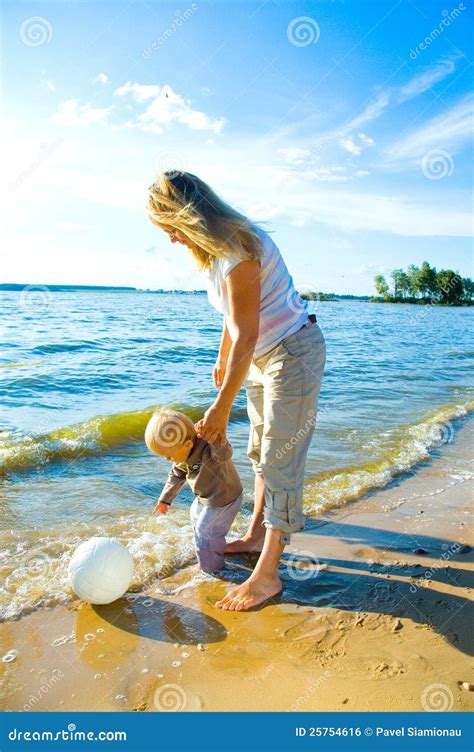 Young Mother And Her Toddler Walking Stock Photo Image Of Beach