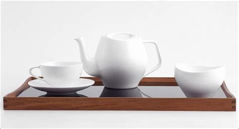 The Simple White Smooth Curves Of This Modern Tea Set Make It A