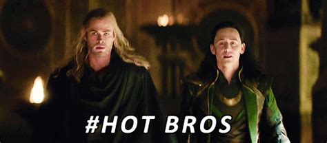 two men standing next to each other with the words hot bros in front of them
