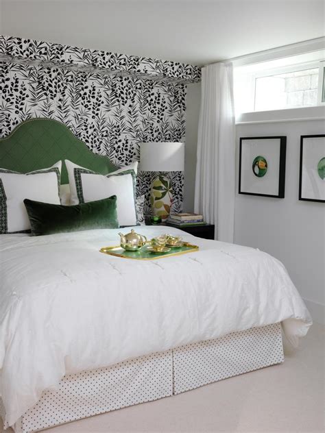 Asian Bedroom With Green Headboard And Patterned Wallpaper Accent Wall