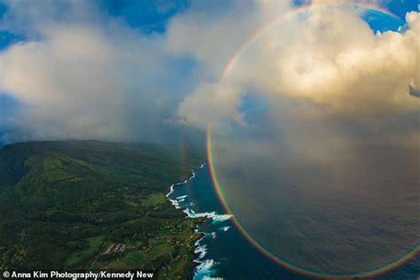 Helicopter Passes Through Rare Full Circle Rainbow Over A