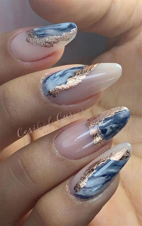 Most Beautiful Nail Designs You Will Love To Wear In 2021 Blue Marble
