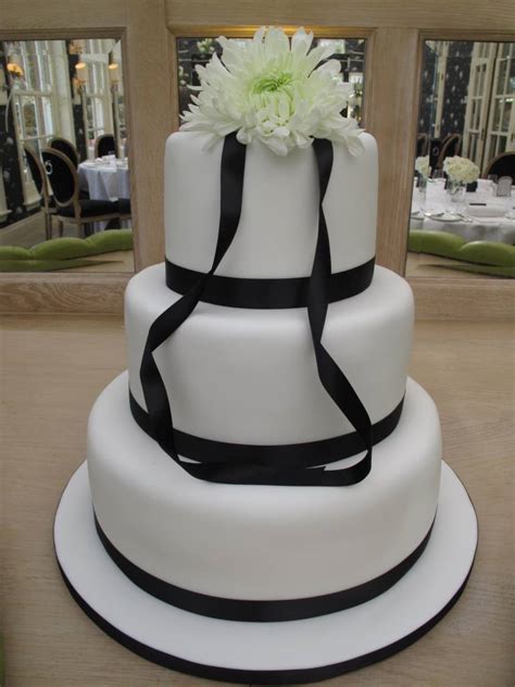 In some parts of england, the wedding cake is served at a wedding breakfast. White wedding cakes and other types of hand made wedding cakes