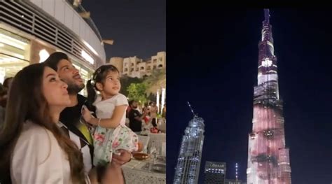 dulquer salmaan is overwhelmed as kurup lights up burj khalifa shares video with wife amal and