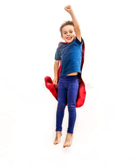 Laughing Isolated Superhero Child Jumping High Flying With Arm Raised
