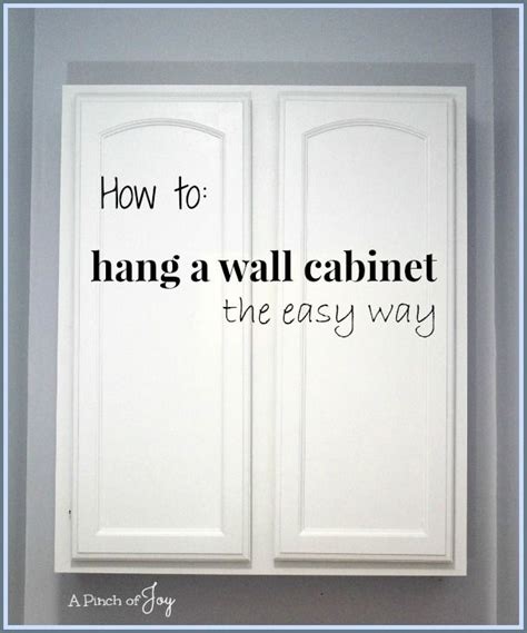 Locate the wall studs in your kitchen wall. How to hang a wall cabinet the easy way -- A Pinch of Joy ...