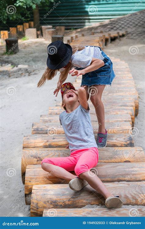 Two Girls Are Fighting In The Playground Stock Image Image Of