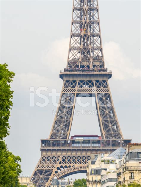 Eiffel Tower Side View From City Streets Stock Photos