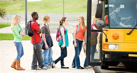 School Bus Line Of Students Boarding Bus Stock Image Image Of Pretty