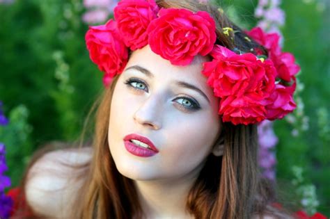Photo Of A Beautiful Girl With A Wreath Of Red Roses On Her Head Free