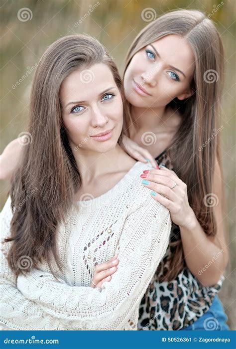 portrait of two beautiful sisters stock image image of natural outdoor 50526361