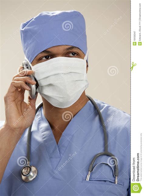 Displaced native middle english lerare (doctor, teacher) (from middle english leren (to teach, instruct) from old english lǣran, lēran. Doctor In Surgical Mask On The Phone Stock Image - Image ...