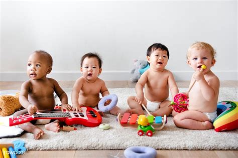 Download Premium Image Of Babies Playing Together In A Play Room 546173