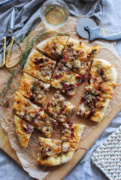 Sun Dried Tomato Pizza With Sausage And Roasted Garlic Bev Cooks