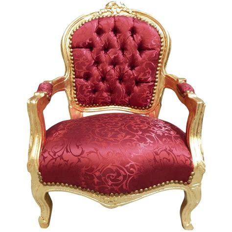 Crafted from metal, solid wood, and manufactured wood frame. Baroque armchair for child red satine and gold wood