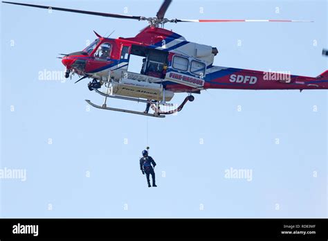 Fire Rescue Helicopter In Air Stock Photo Alamy