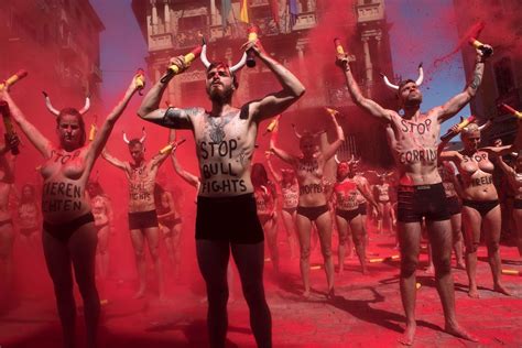 Watch Dozens Of Topless Activists Protest Bullfighting Before The