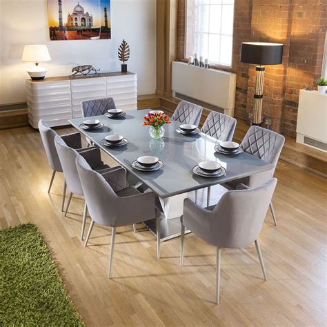 A rectangular table would be best for seating 10 people. Large 8 Seat Grey Glass Top Dining Table 2.2m +8 Grey ...