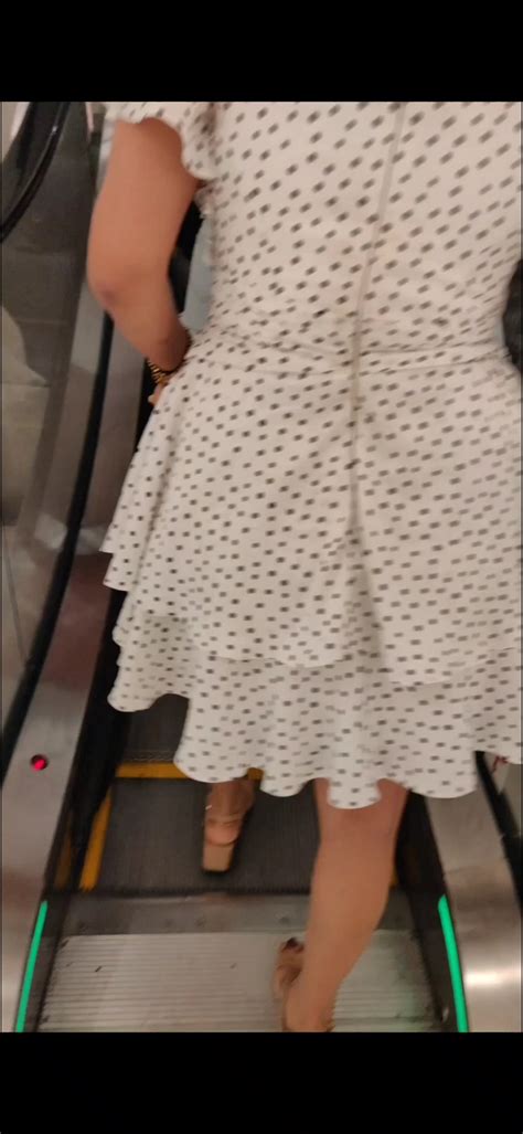 Desi Babe Upskirt Smooth Legs And Thighs Closeup On Escalator