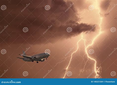 Passenger Airplane Landing In The Stormy Weather On The Backdrop