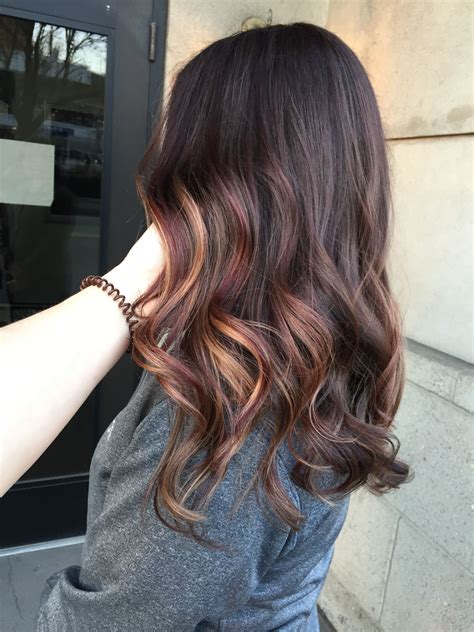 The warm golden undertones is why it's loved by expert stylists and celebrities alike! Burgundy red and caramel blonde balayage on brunette by ...