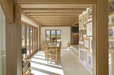 Oak Framed Dining Room Sits Two Steps Down From The Kitchen And