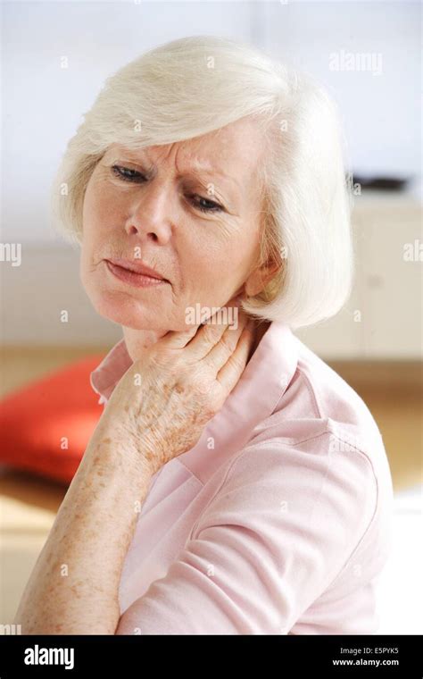 Woman Suffering From Neck Pain Stock Photo Alamy