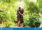 Couple in Love are Standing at Sunset in the Jungle Stock Photo - Image ...