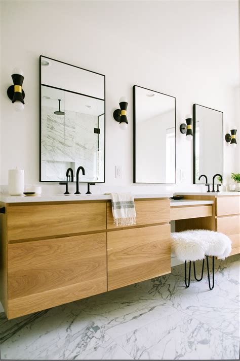 Naos abigail 36, naos, bright white bathroom vanity, right sink. Floating white oak vanity with marble floors. Cambria Quartz weybourne countertops. Black ...