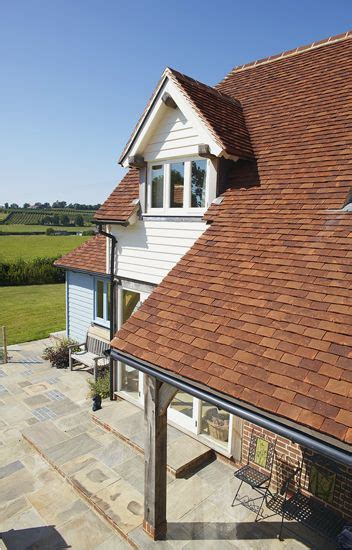 Handmade Clay Plain Tiles To Veranda Roof With Oak Framed Dormer