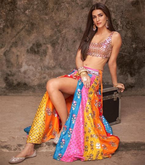 Take Kriti Sanons Colourful Luka Chuppi Lehenga To Your Bffs Mehandi Vogue India Wedding
