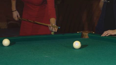 Beautiful Woman In Red Evening Dress Playing Pool Stock Video Footage