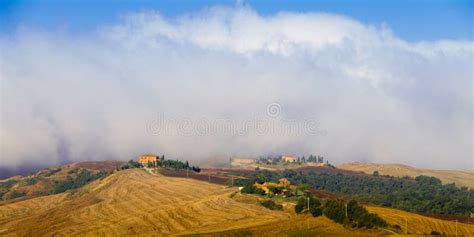 Crete Senesi Landscape In Tuscany Italy On A Foggy Dawn Stock Image