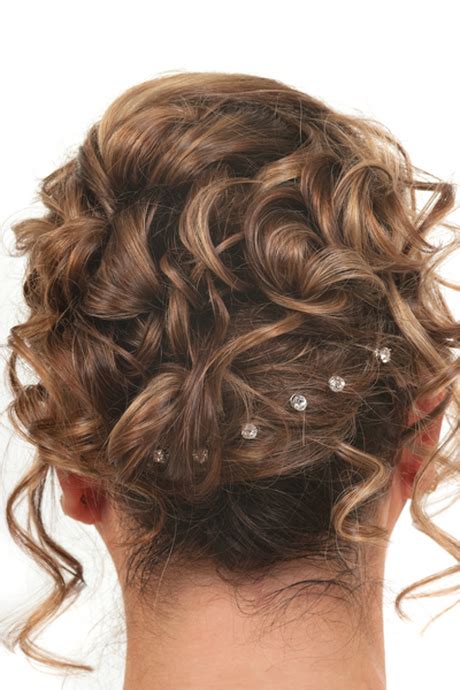 Roll up your curls and gather them into an updo ponytail. Curly updo prom hairstyles