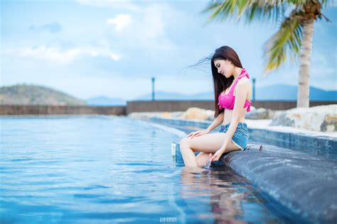 wallpaper women asian sitting jean shorts swimming pool 2048x1366 motta123 1376039