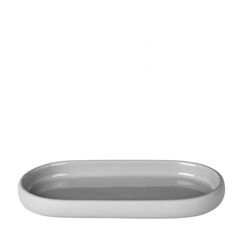 A White Oval Dish On A White Background