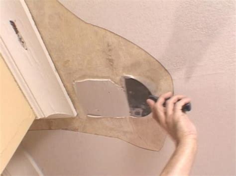 Fixing holes in a plaster ceiling. How to Repair a Ceiling | how-tos | DIY