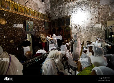 Ethiopian Pilgrims And Ethiopian Orthodox Priests Praying Inside The