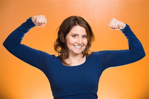 Woman Flexing Muscles Showing Displaying Her Strength Stock Photos