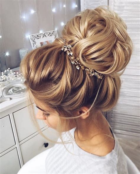 Most wedding hairstyles require detailing. This beautiful high bun wedding hairstyle perfect for any wedding venue | Unique wedding ...
