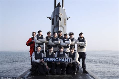 Royal Navy Submarine Crew Enjoy A Game Of Cricket At The North Pole