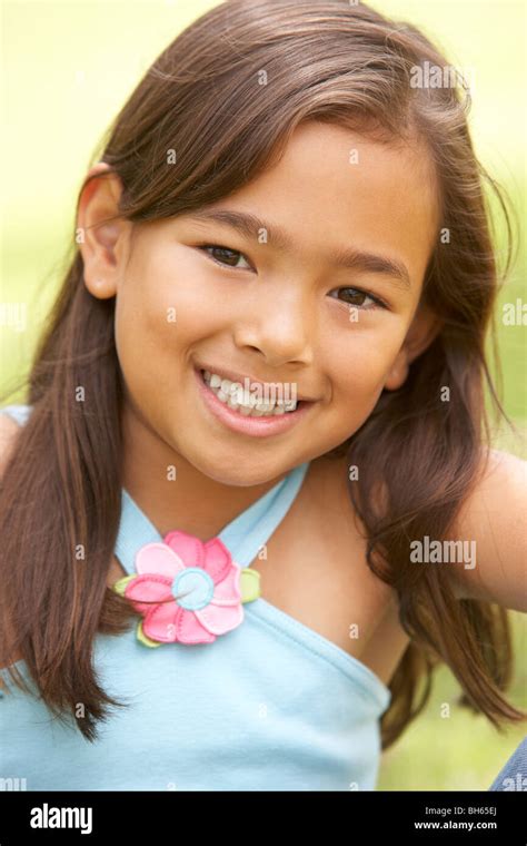 Portrait Of Young Girl In Park Stock Photo Alamy
